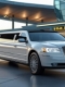 Abholung am Flughafen mit einem Limousine mit Strip